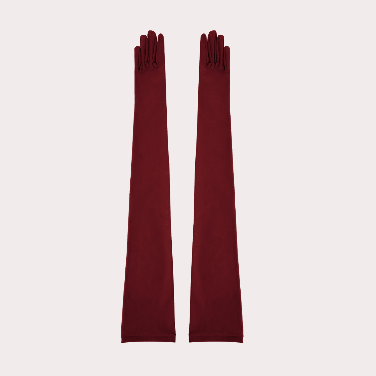 Pair of wine long gloves on a light beige background