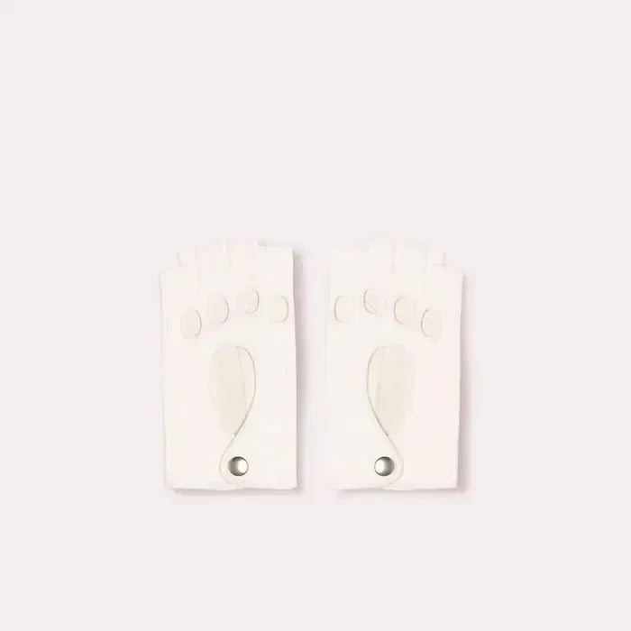 Top view of Patricia Field's Virgin White Italian leather fingerless driving gloves from Emily in Paris with snap button closure.