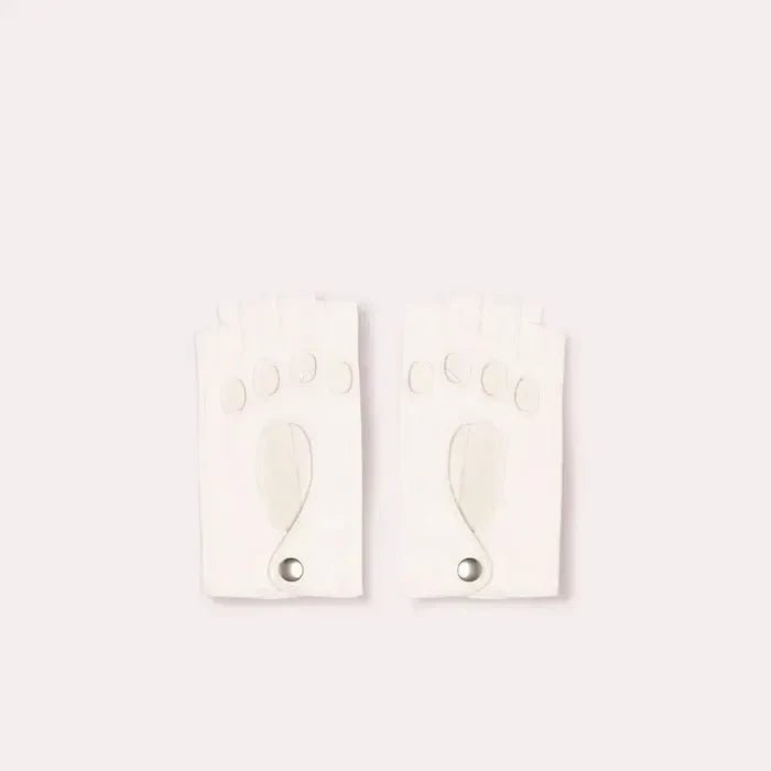 Top view of Patricia Field's Virgin White Italian leather fingerless driving gloves from Emily in Paris with snap button closure.