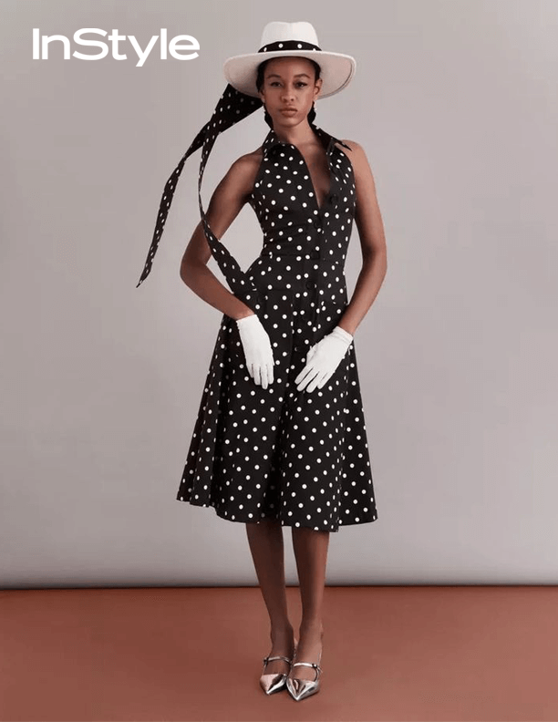 Black and white polka dot halter dress with matching hat and gloves, vintage-inspired fashion